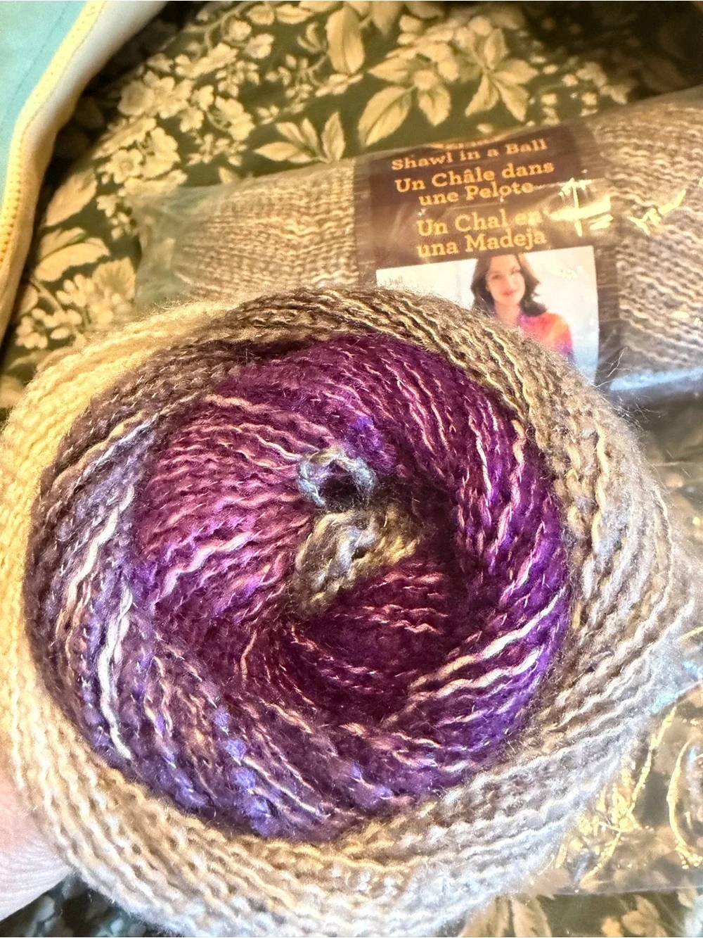 Lion brand shawl in a ball in mindful mauve, two balls new in plastic.